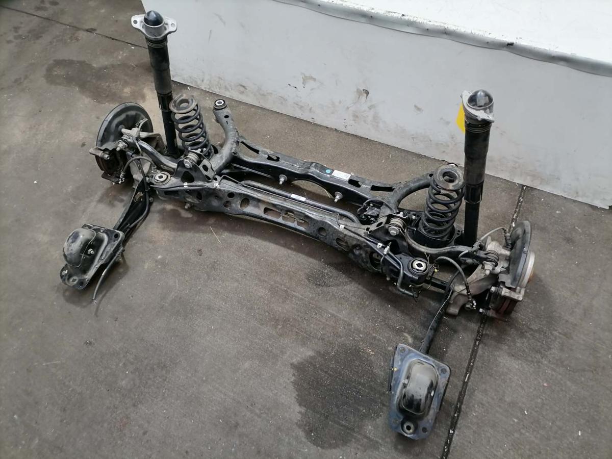 VW Passat B9 original Hinterachse mit Achsschenkel und Lenker 1,5 E-Hybrid 150KW Bj.2024